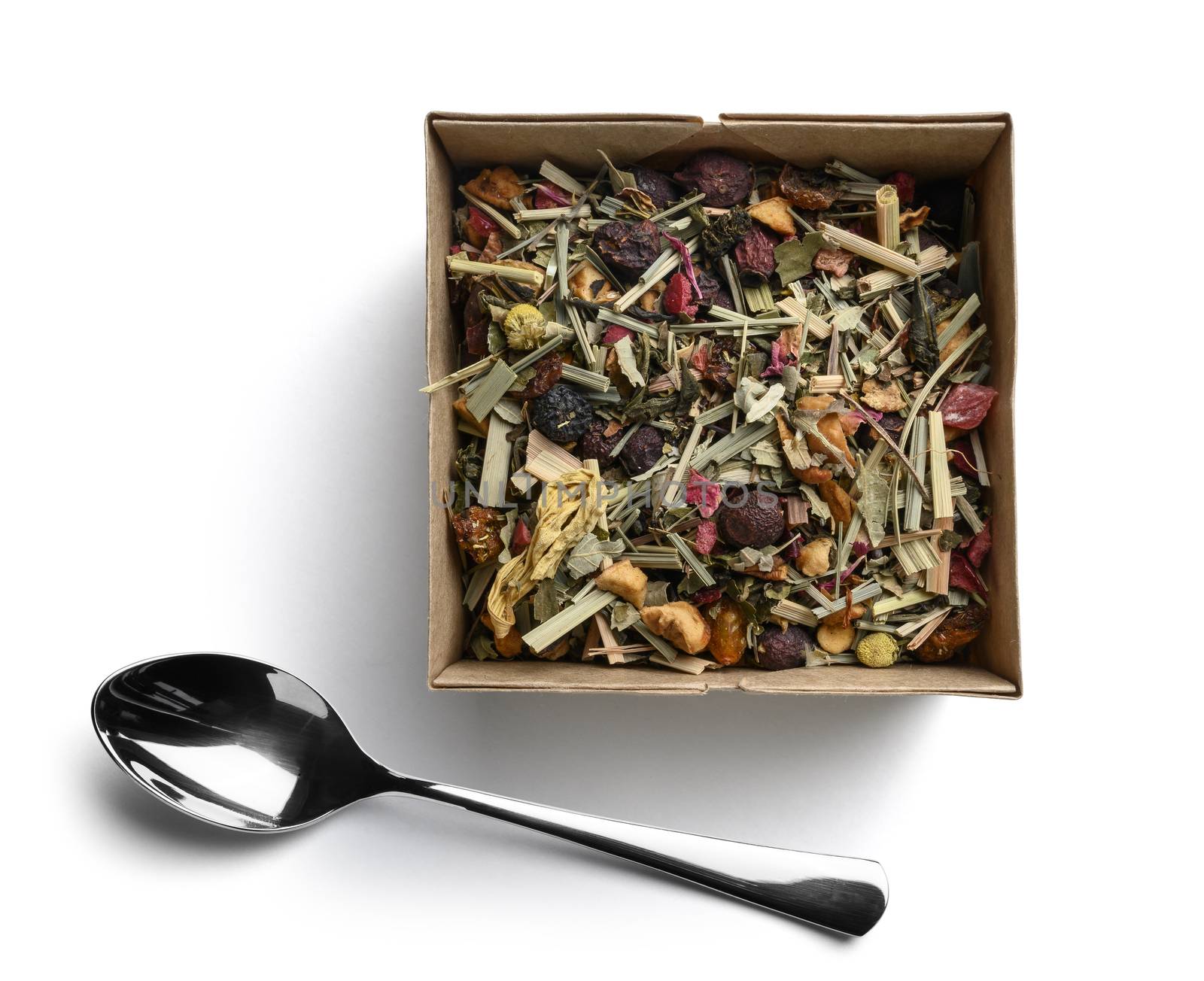 Green tea with natural aromatic additives. Top view on white background.