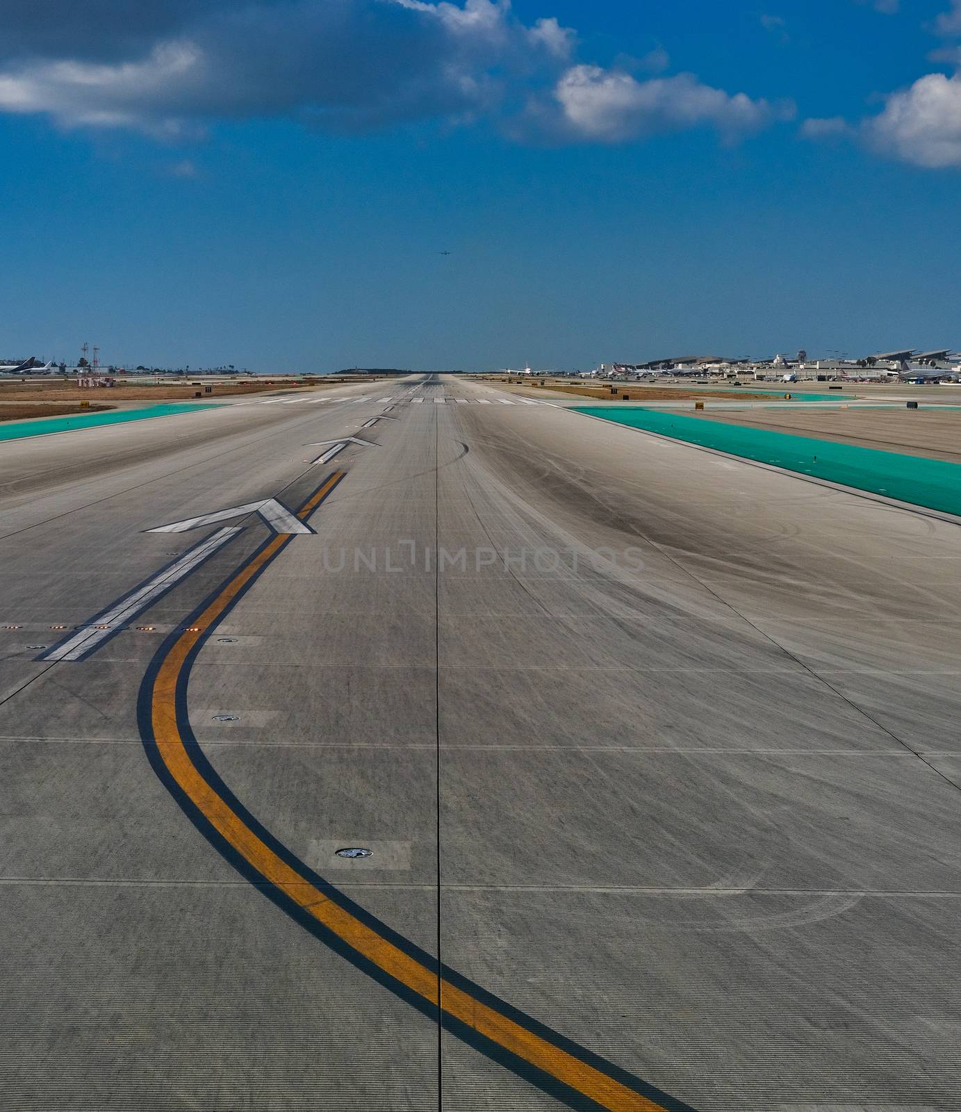 Empty Runway into Distance at a Marjor Airport