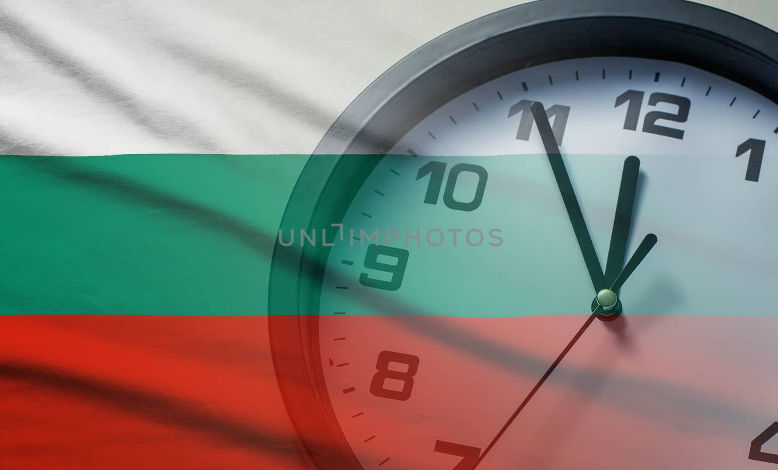 Bulgaria flag with dial of a clock counting down to twelve noon or midnight in a concept of crisis, deadlines or new year,