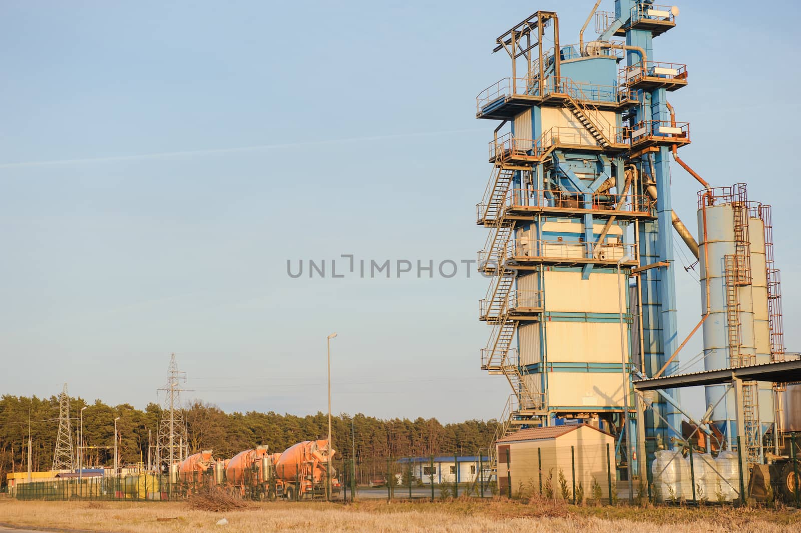 Modern industrial exterior building over blue sky