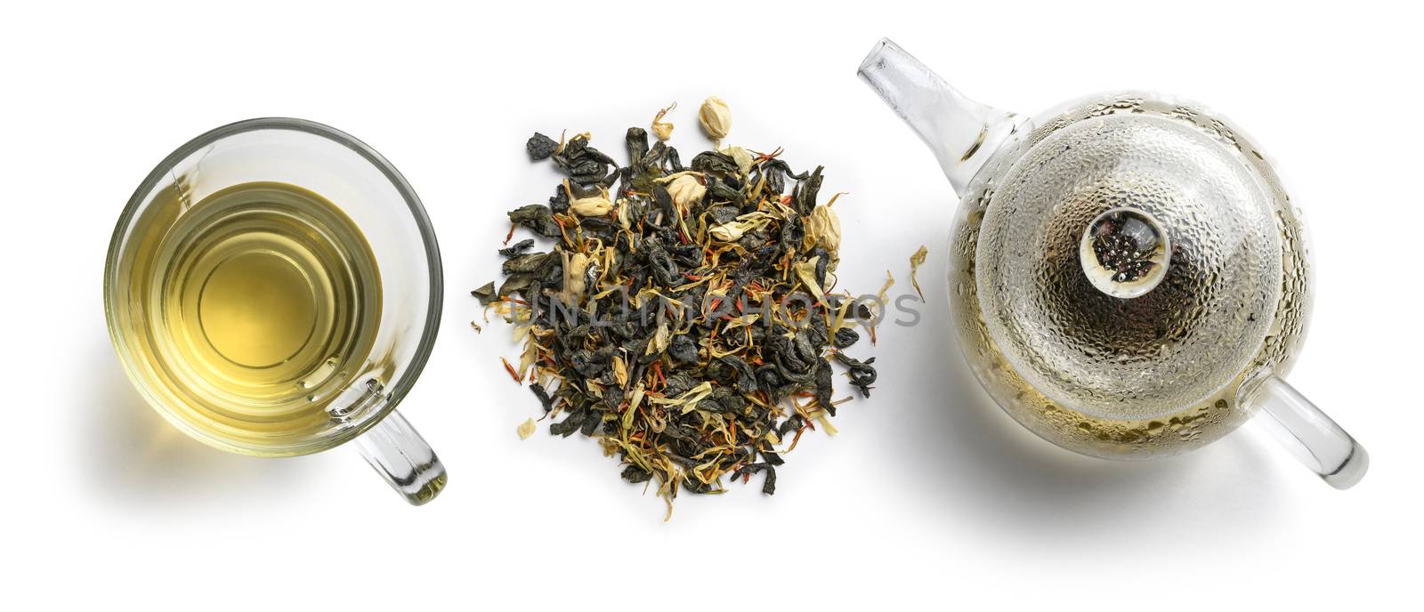 Green tea with natural aromatic additives and a teapot. Top view on white background by butenkow