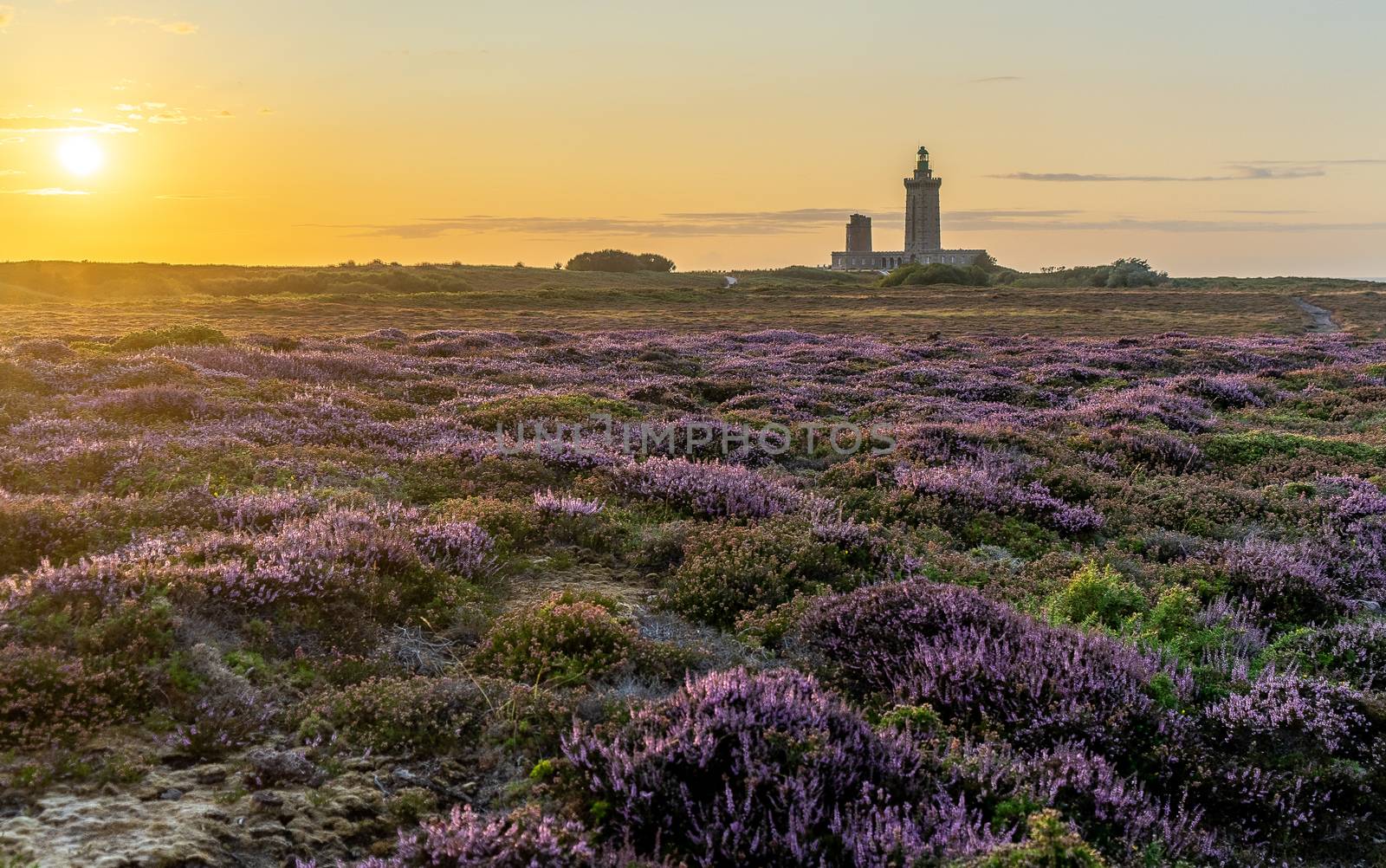 Romantic sunset in France sea coast travel attraction lighthouse