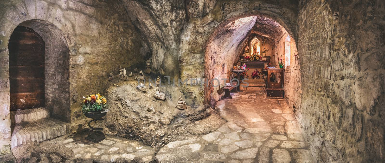 cavern church of Santa Maria Infra Saxa in the Frassassi and Valadier temple area - Marche region - Italy .