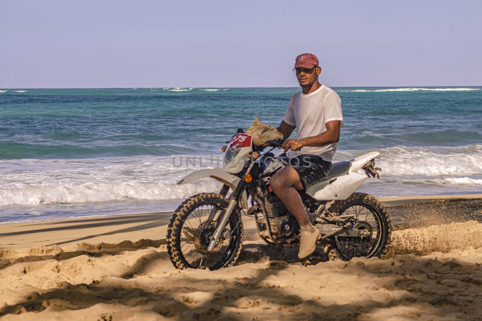 Biker on the Caribbean beach 4 by pippocarlot