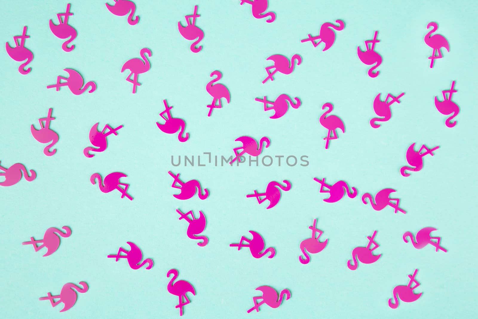 Summer tropical background, chaotic pattern made of numerous pink flamingo confetti on turquoise pastel background, flatly. Summertime, relax, joy, pool party concept. Horizontal orientation by ALLUNEED