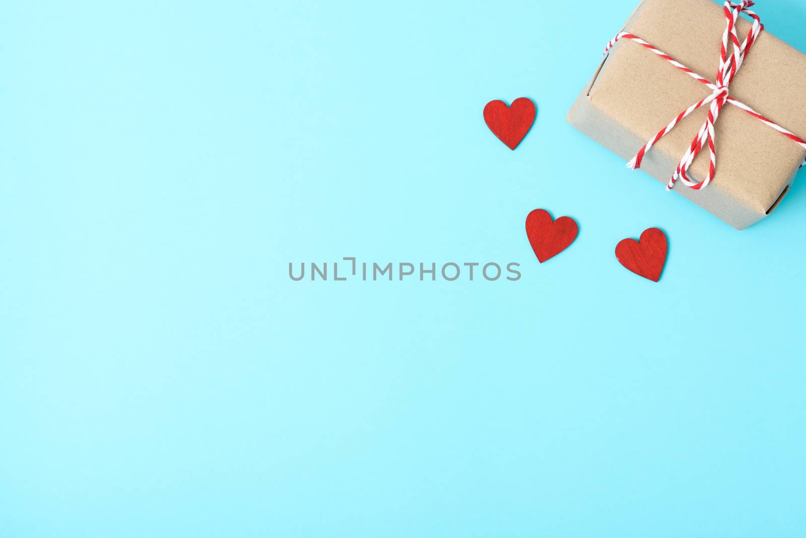 Valentine's Day Concept, Top view Flat lay, gift box and red heart on blue background with copy space for your text