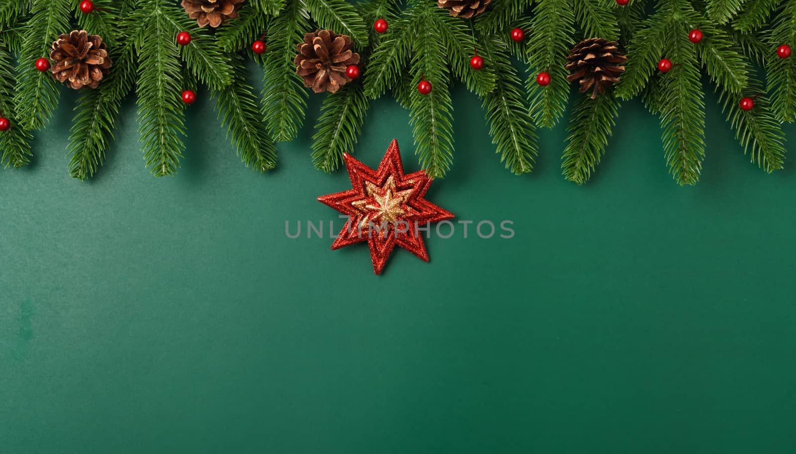 Happy new year, christmas day concept top view flat lay fir tree branches and decoration on Olive Green background with copy space for your text