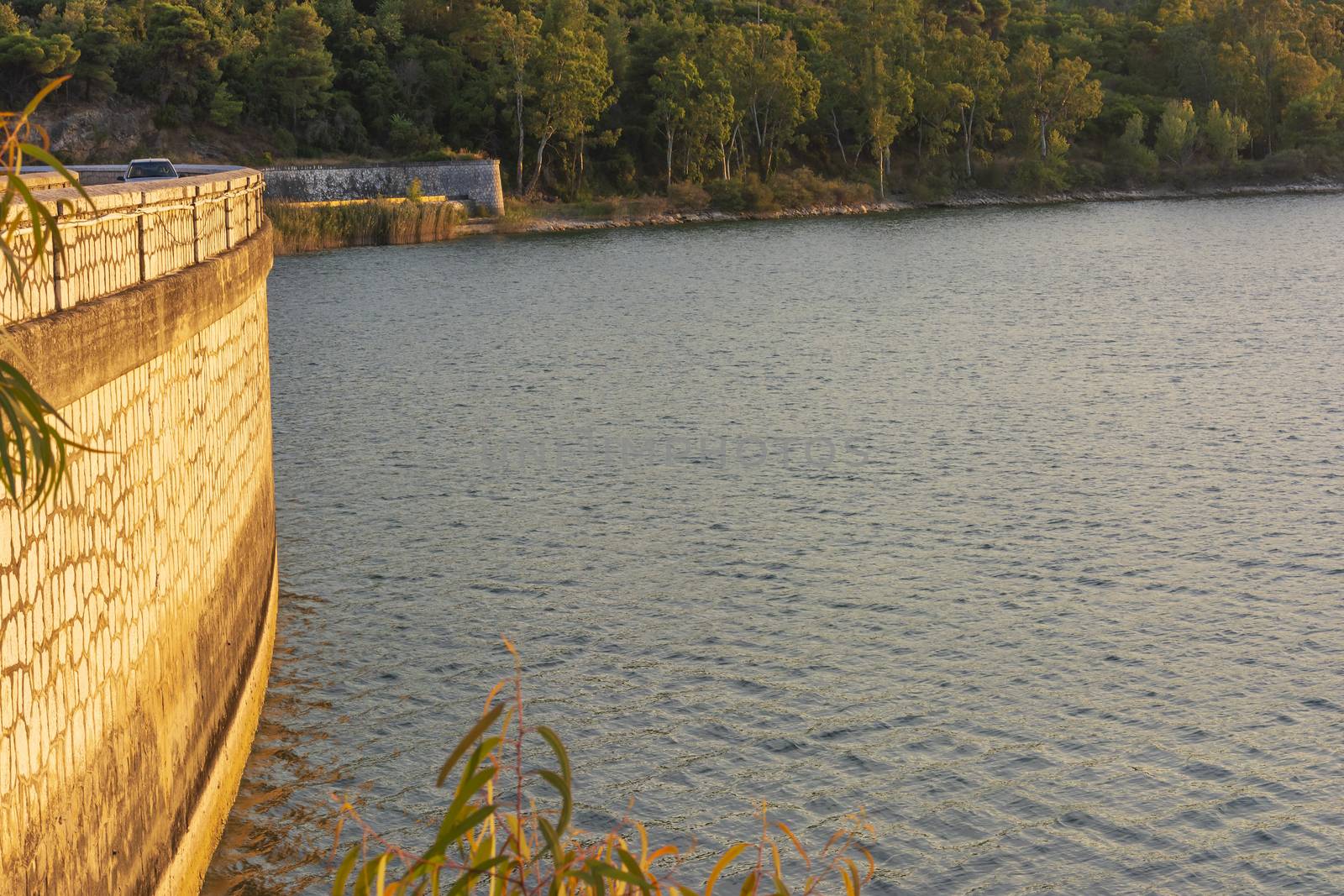 Lake Marathon and dam on a autumn evening, Attica, Greece by ankarb