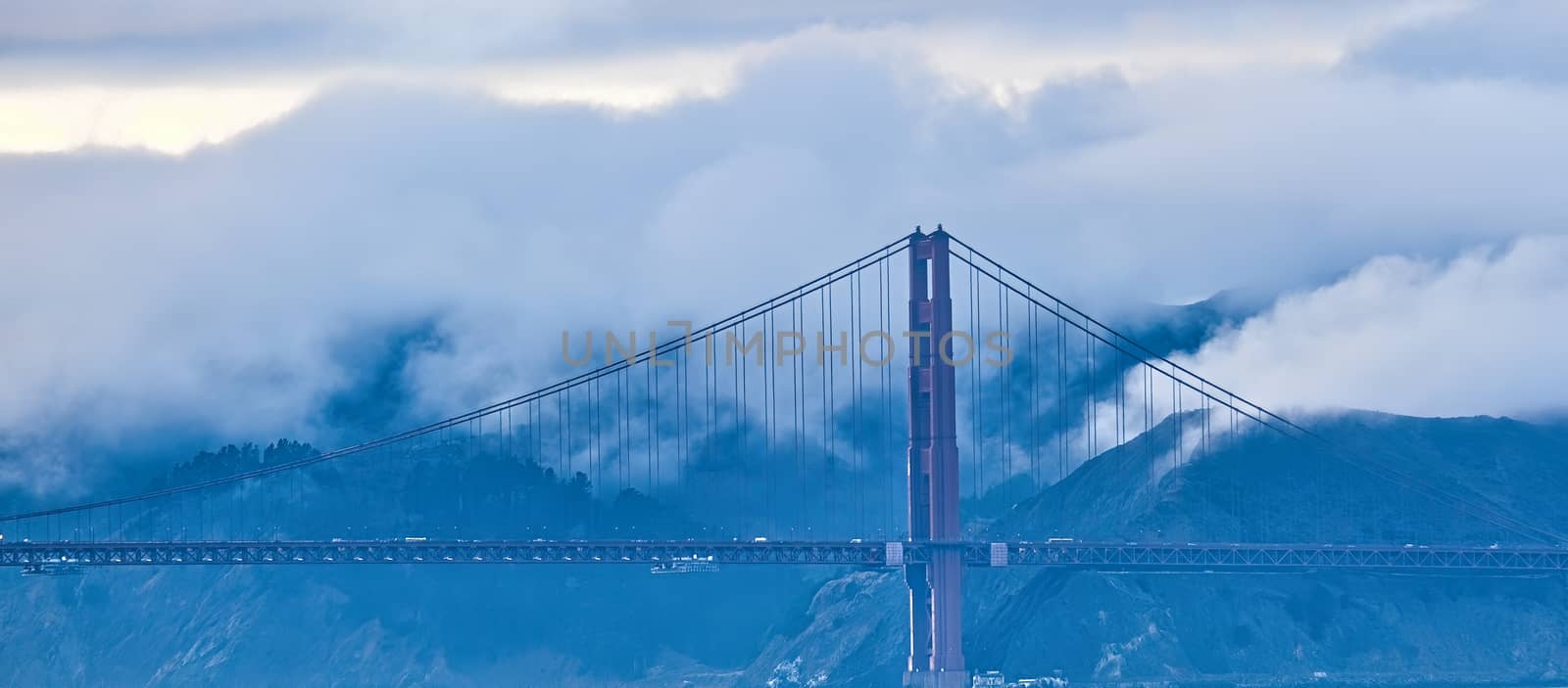 Golden Gate Against Foggy Hills by dbvirago