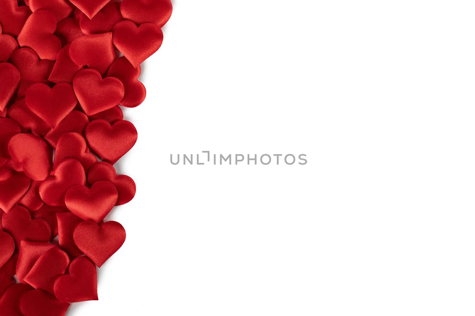 Valentine's day many red silk hearts background , border frame isolated on white with copy space, love concept