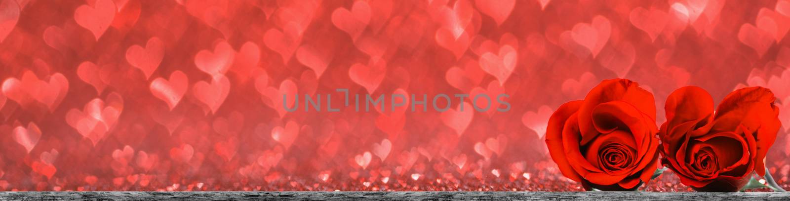 Hearts of red roses on red heart bokeh background Valentines day design