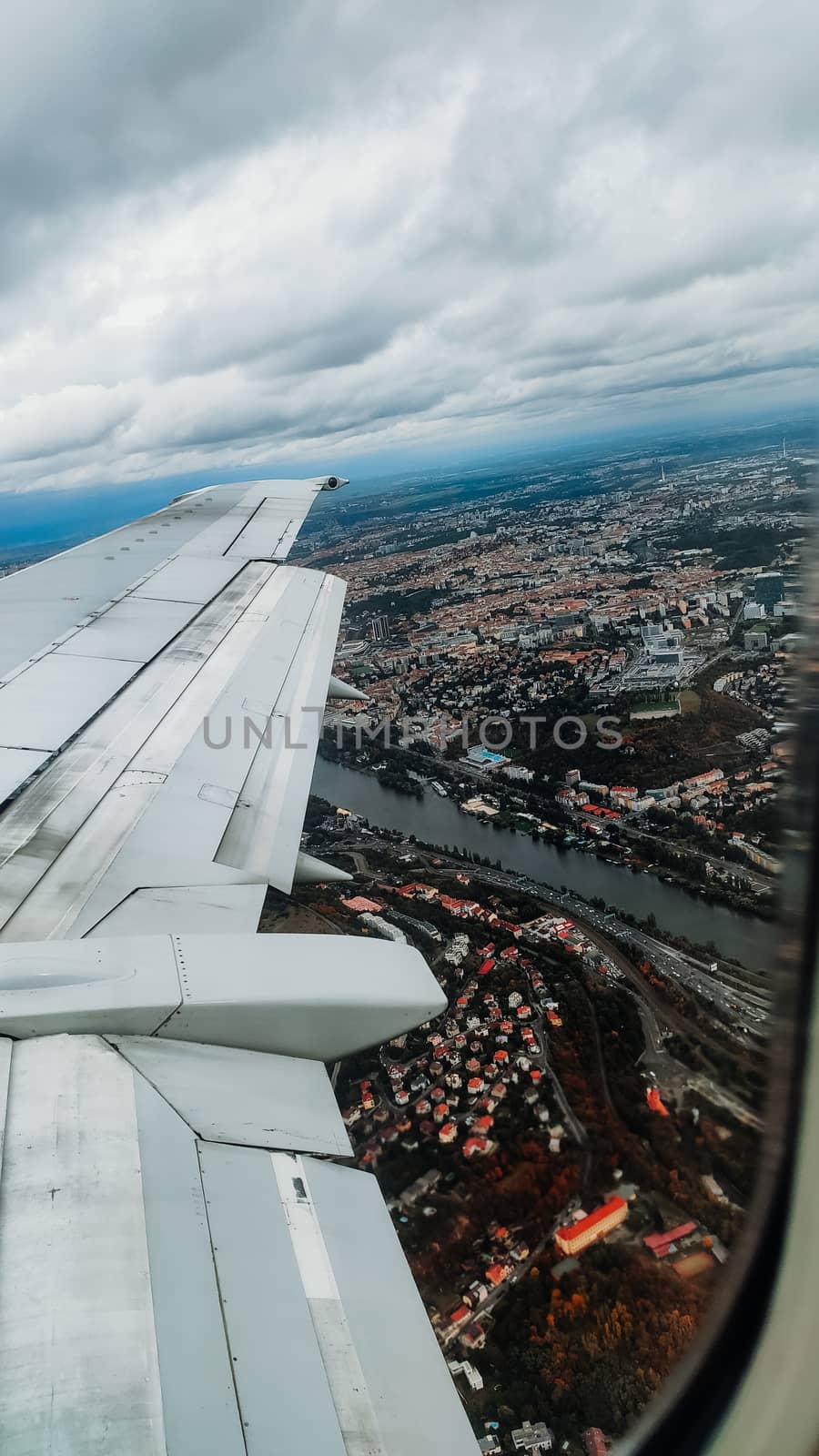 View of Prague from the window of the aircraft - vertical photo