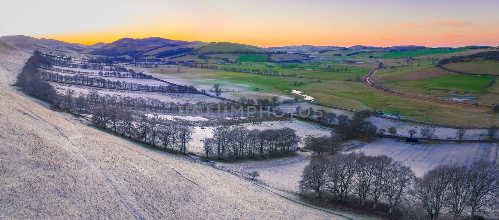 Panorama Of A Frosty Winter Landscape In The Hilly Scottish Borders At Sunset