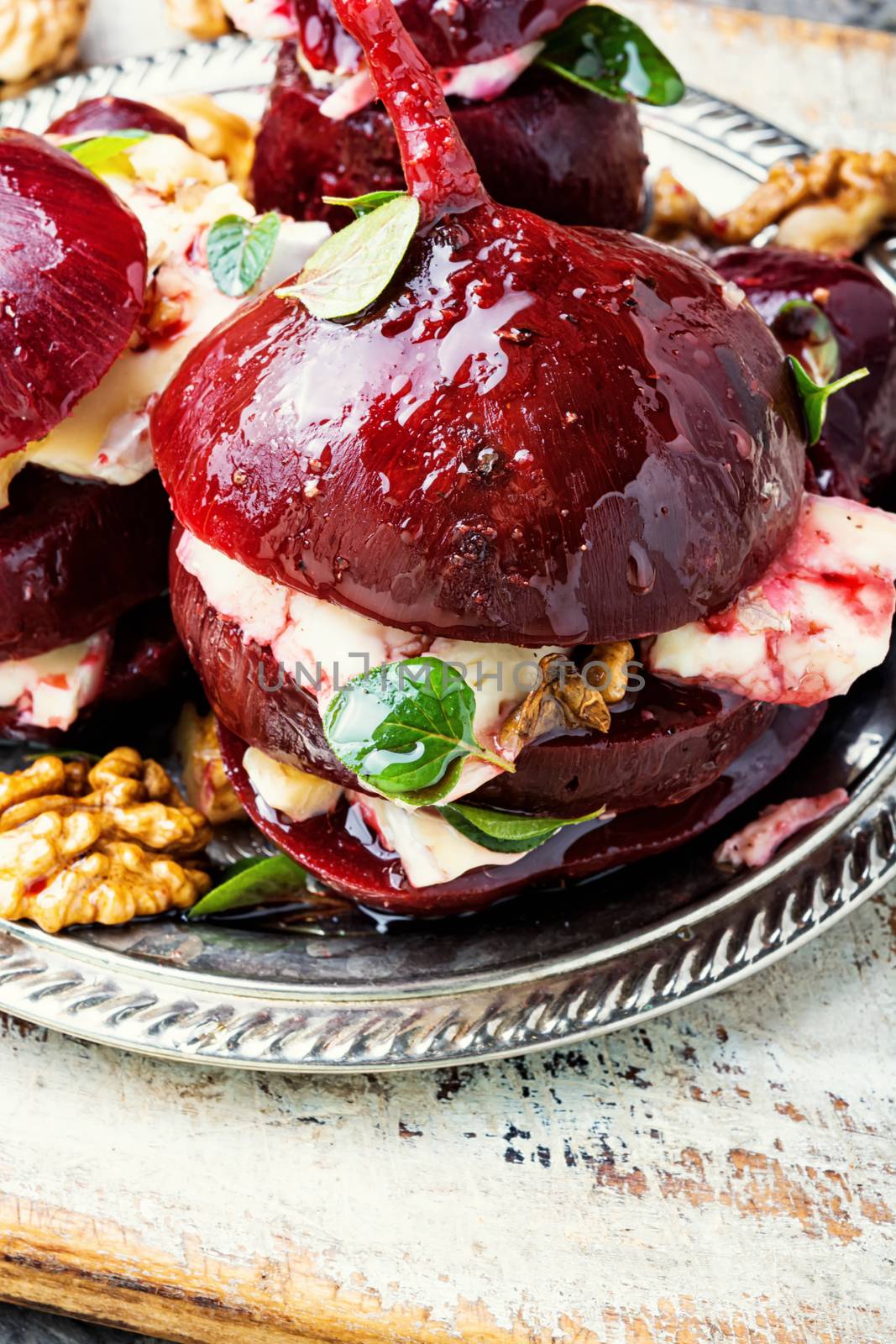 Boiled beetroot with soft cheese and walnut