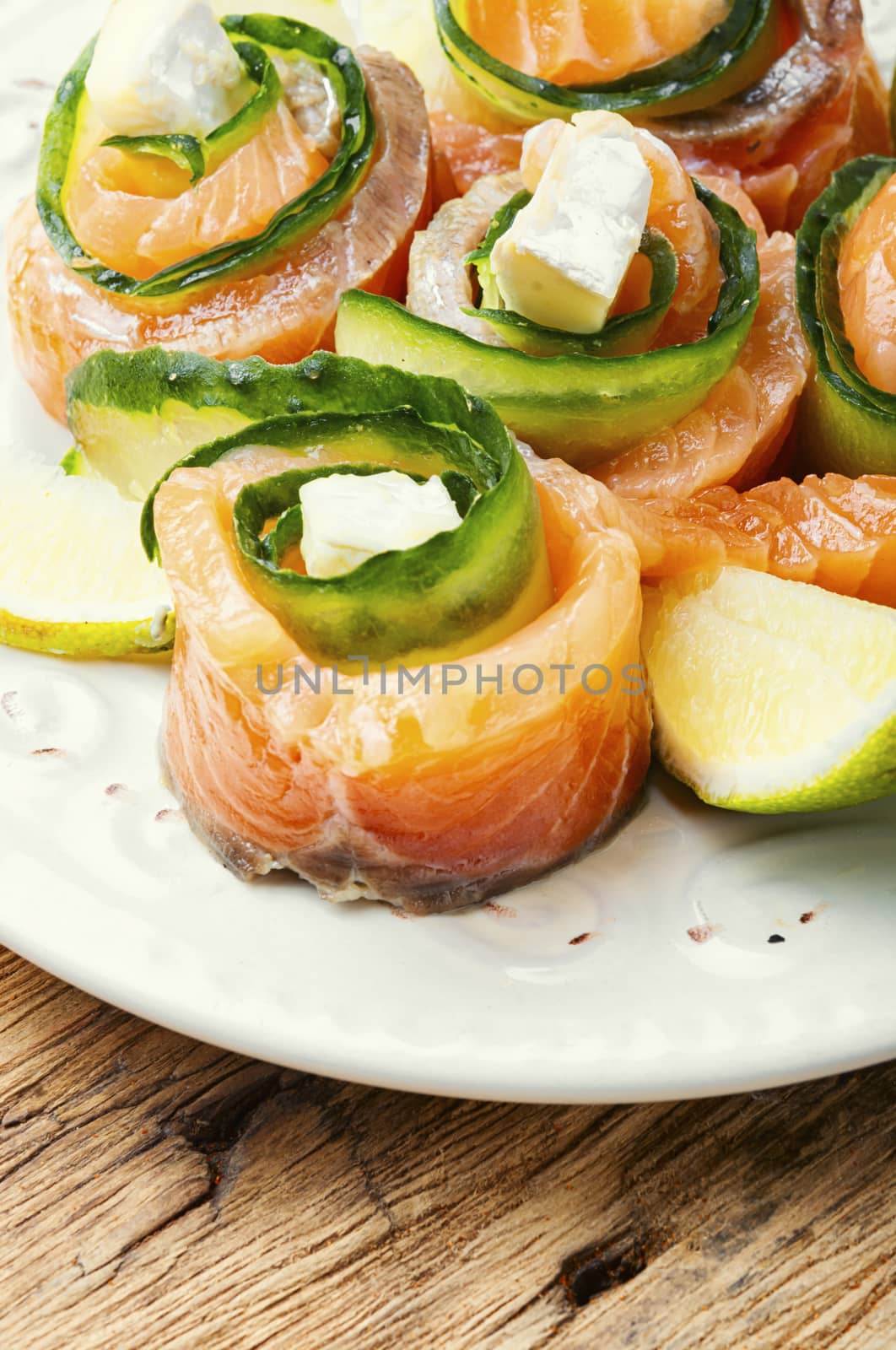 Salted salmon stuffed with cucumber and cheese.