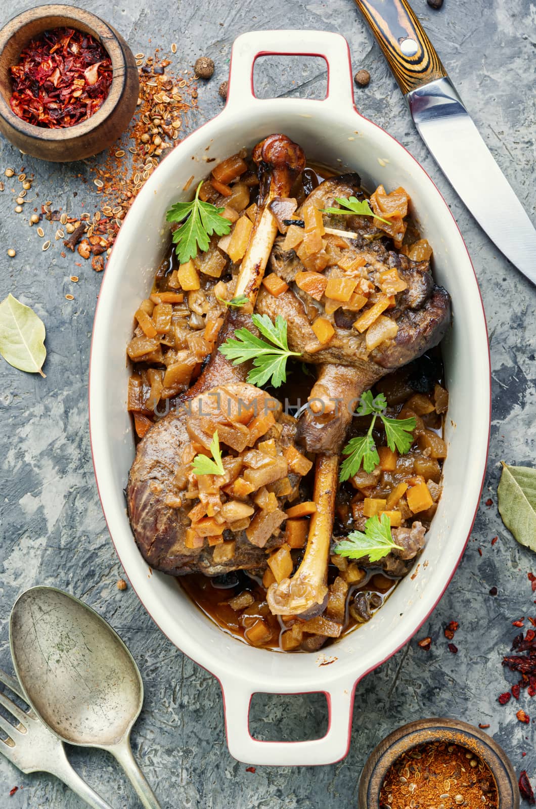 Holiday duck legs baked in apple sauce