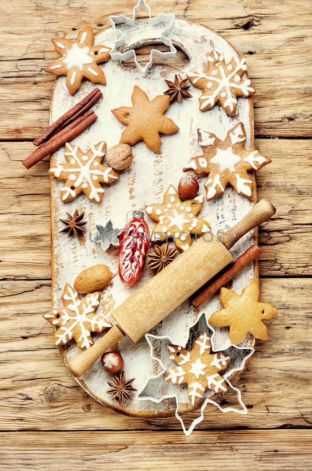 Christmas gingerbread cookies with festive decoration.Christmas cookie on a wooden background