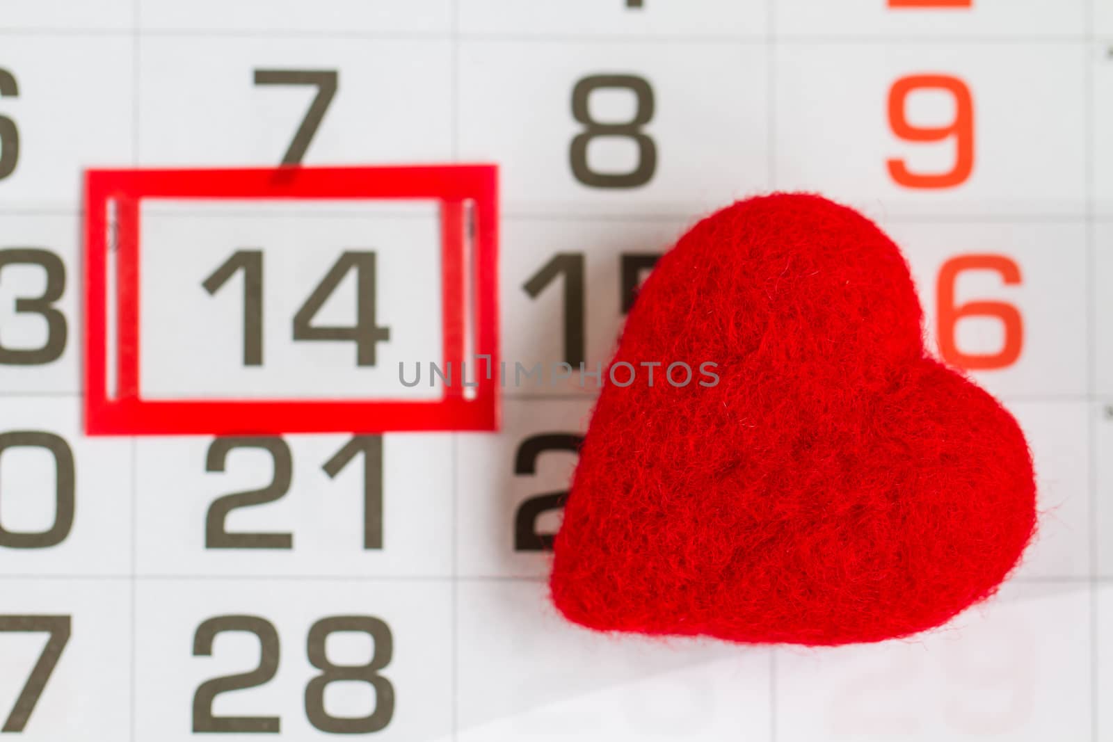 Calendar Page On Saint Valentines Day With Red Heart