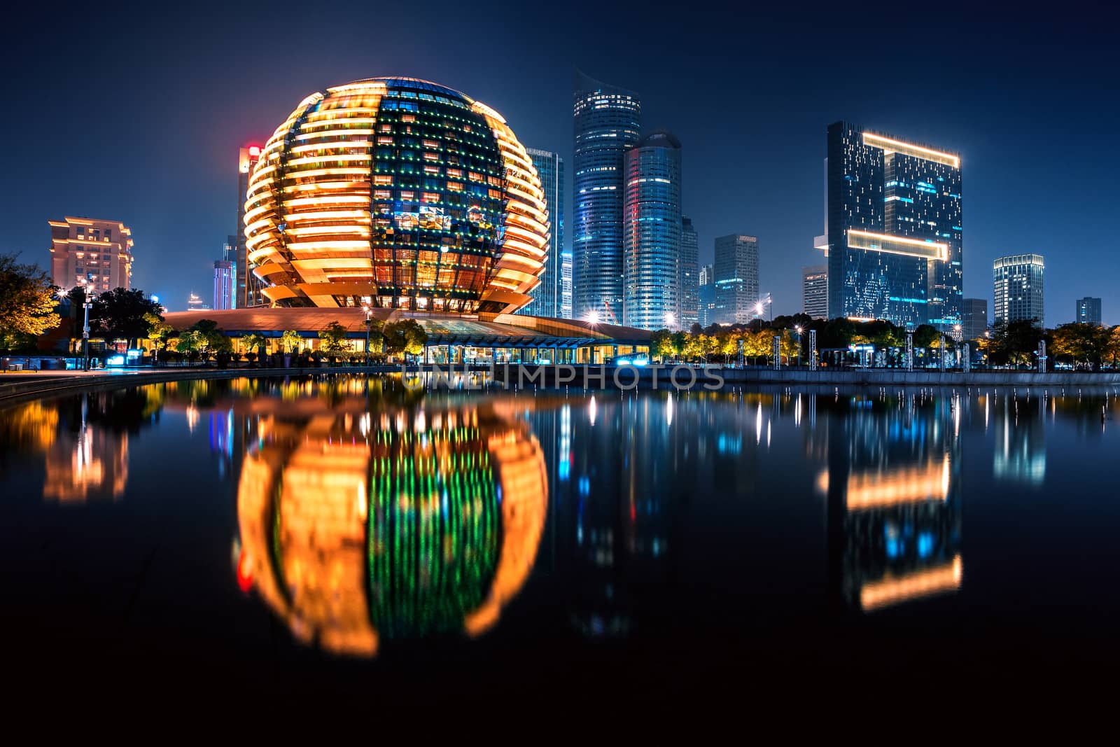 Night view of Qianjiang New Town with reflection, Hangzhou, Zhejiang, China by zhu_zhu