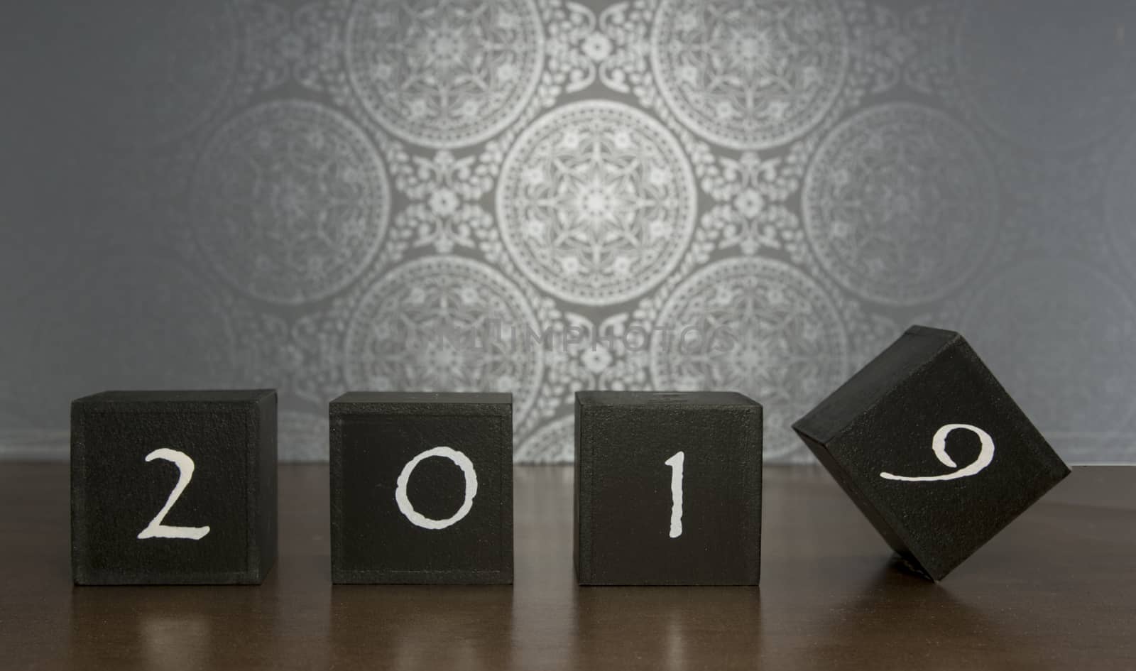 black blocks with 2018 changing in 2019 on dark background