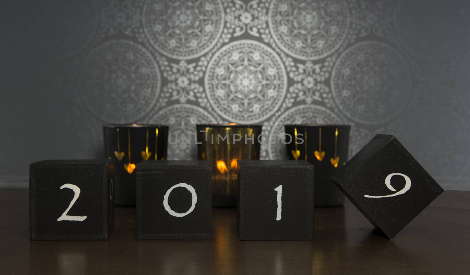 black blocks with 2018 changing in 2019 on dark background