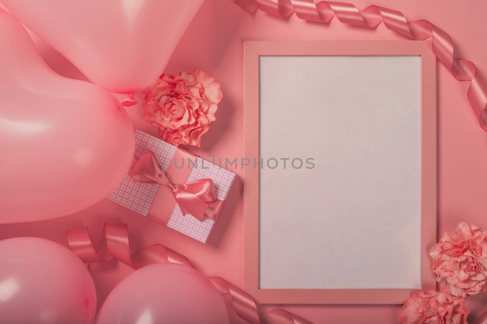 Happy valentines day greetings many heart shaped pink balloons and foto frame with copy space for text , background border flat lay with copy space for text