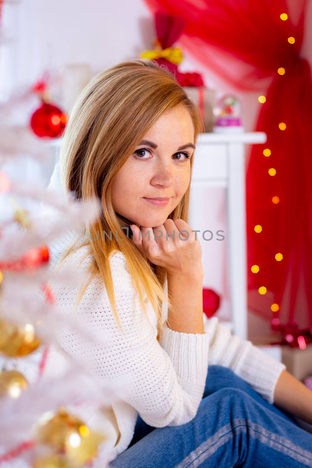 Portrait of a close-up of a girl in the New Year's interior