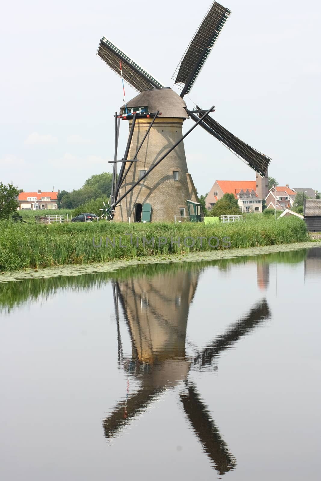 A beautiful, old, historic windmill, with four wings