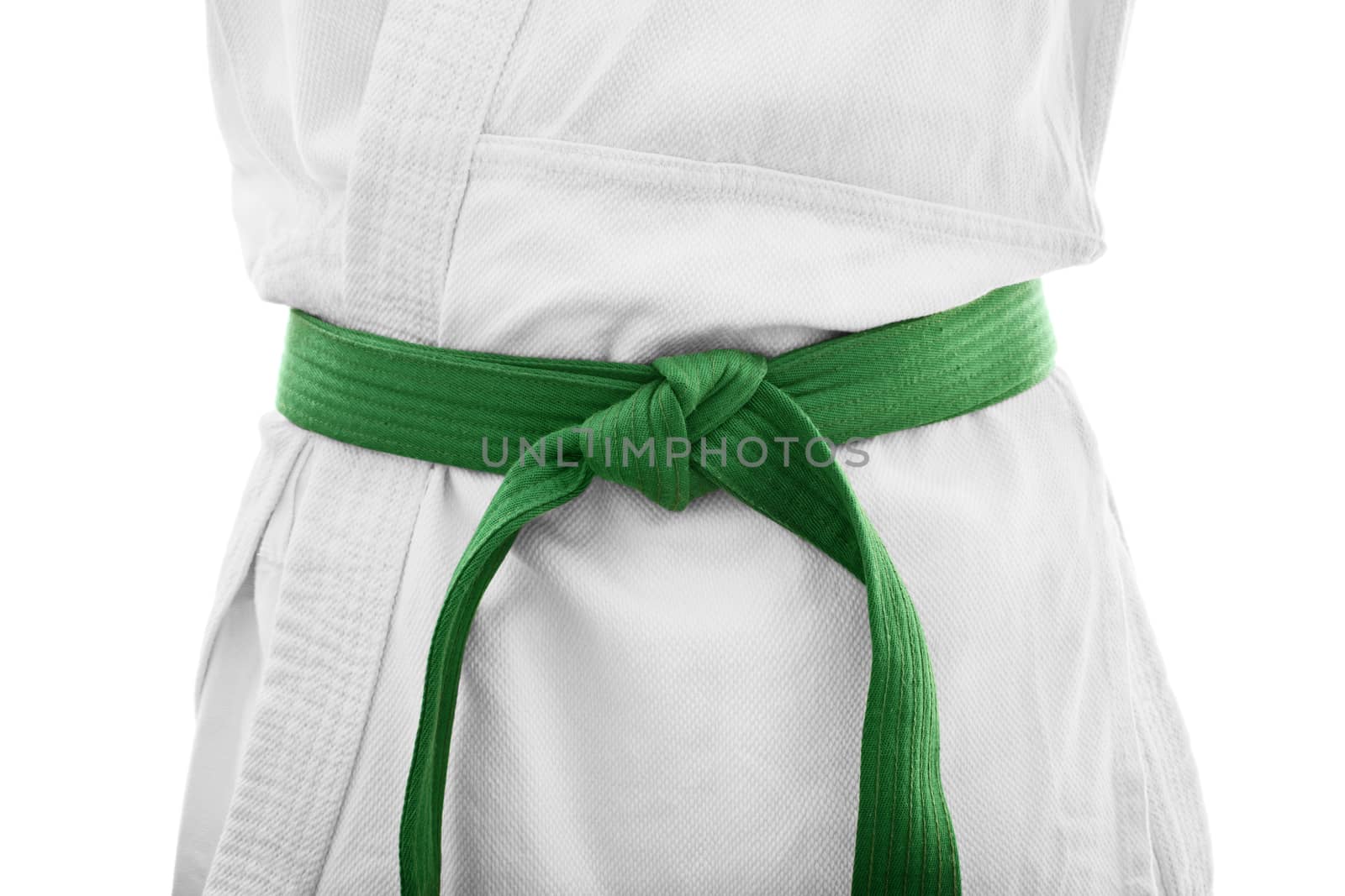 Green belt karate. Close up shot of the mid section of a martial arts fighter in white kimono with green belt, isolated on white background.