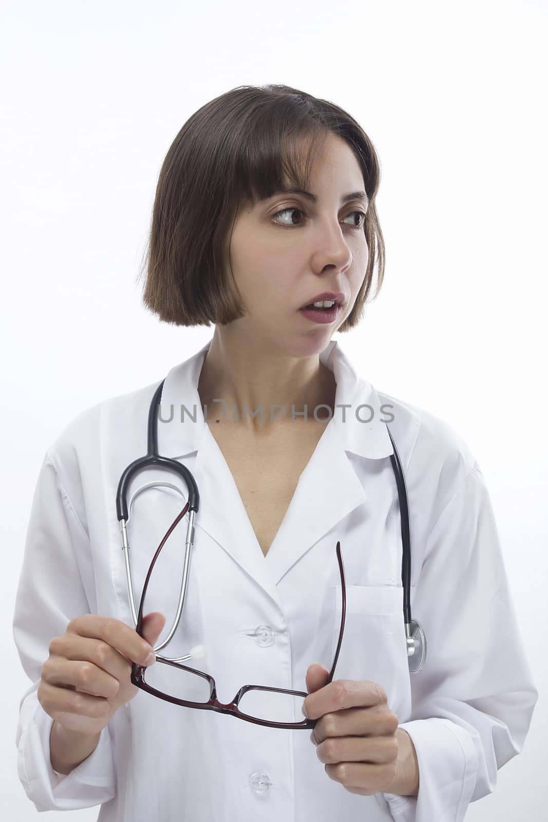 Young female doctor on white isolated background