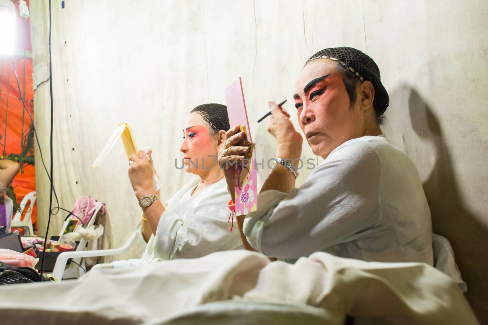 Asia / Thailand - August 28th 2019 : Chinese Opera Actress. Performers make up at backstage. 