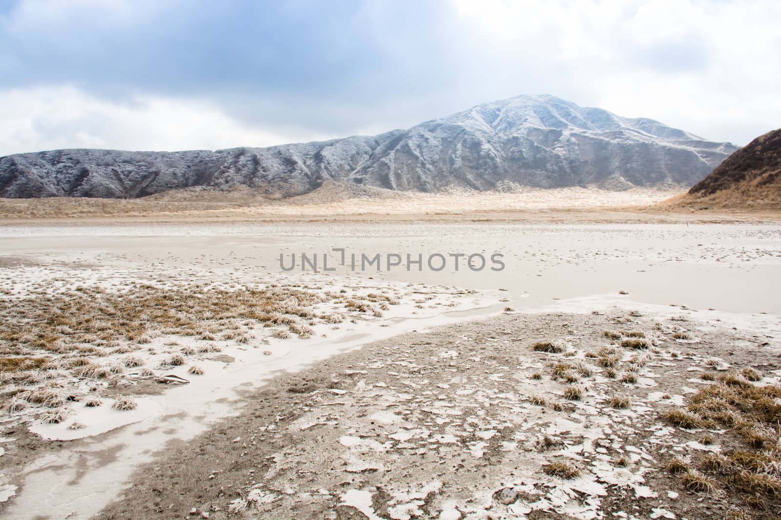 Mount Aso and Kusasenri in winter. covered by golden yellow grassland - Kumamoto, Japan