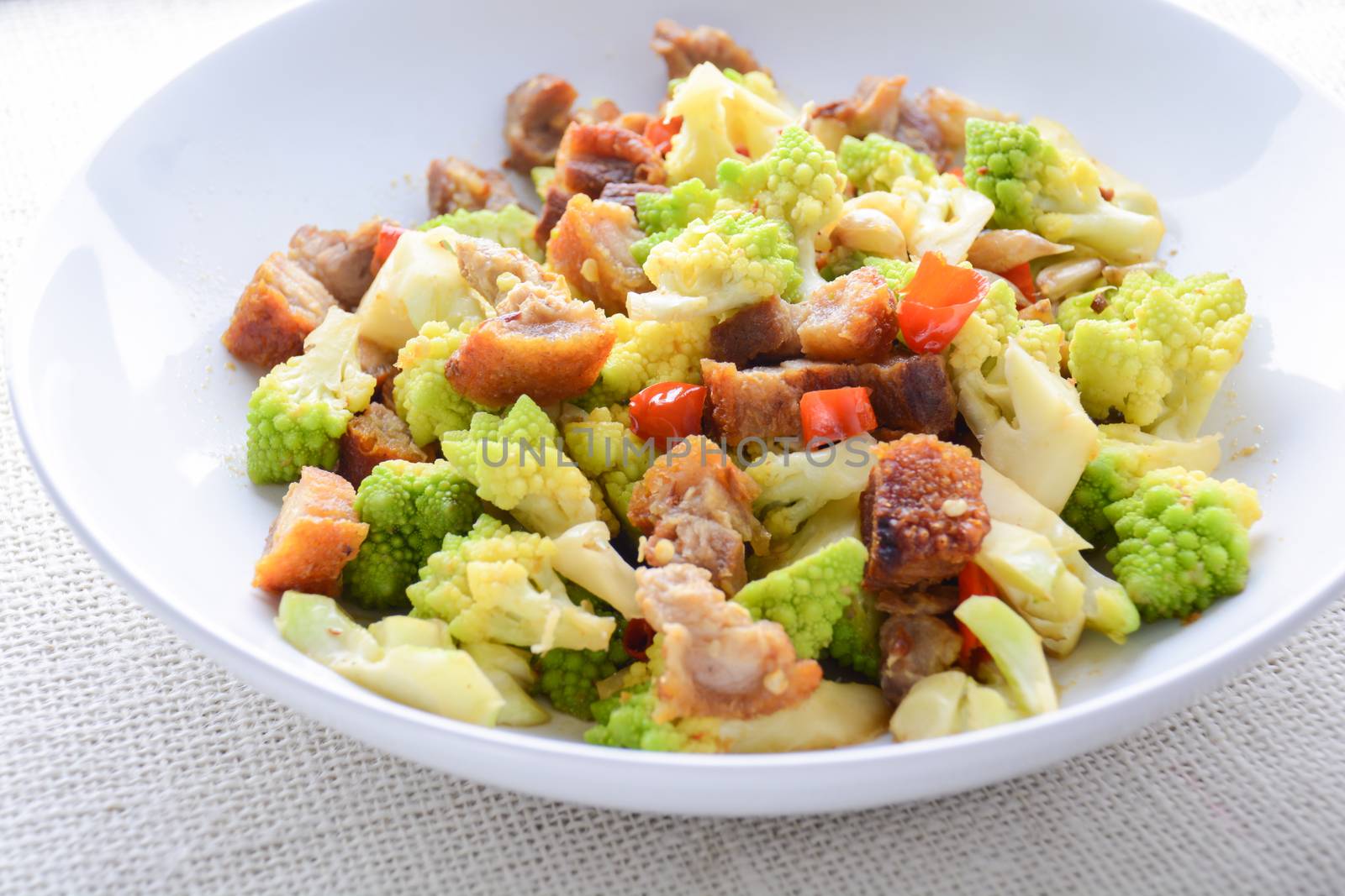 Stir fry Romanesco broccoli with crispy pork and chili, very healthy and delicious