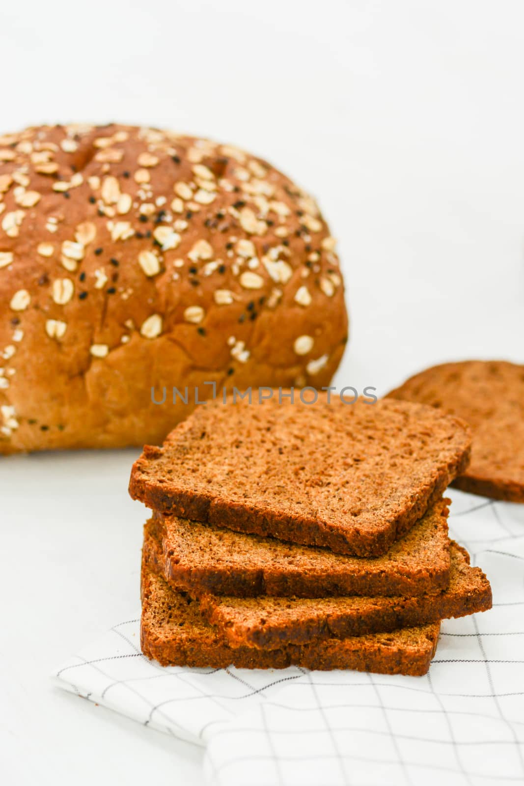 Rye bread isolated on white background by yuiyuize