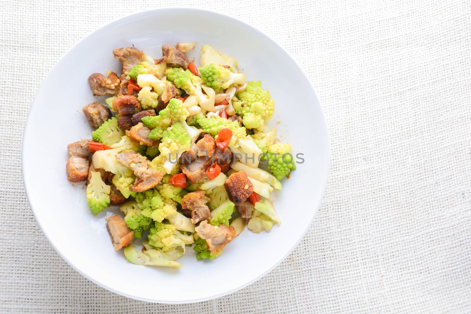 Stir fry Romanesco broccoli with crispy pork and chili, very healthy and delicious