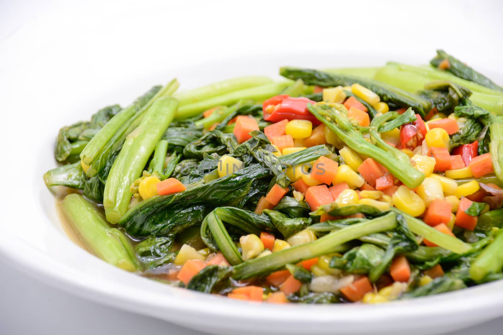 Stir fried Chinese kale with oyster sauce and pork