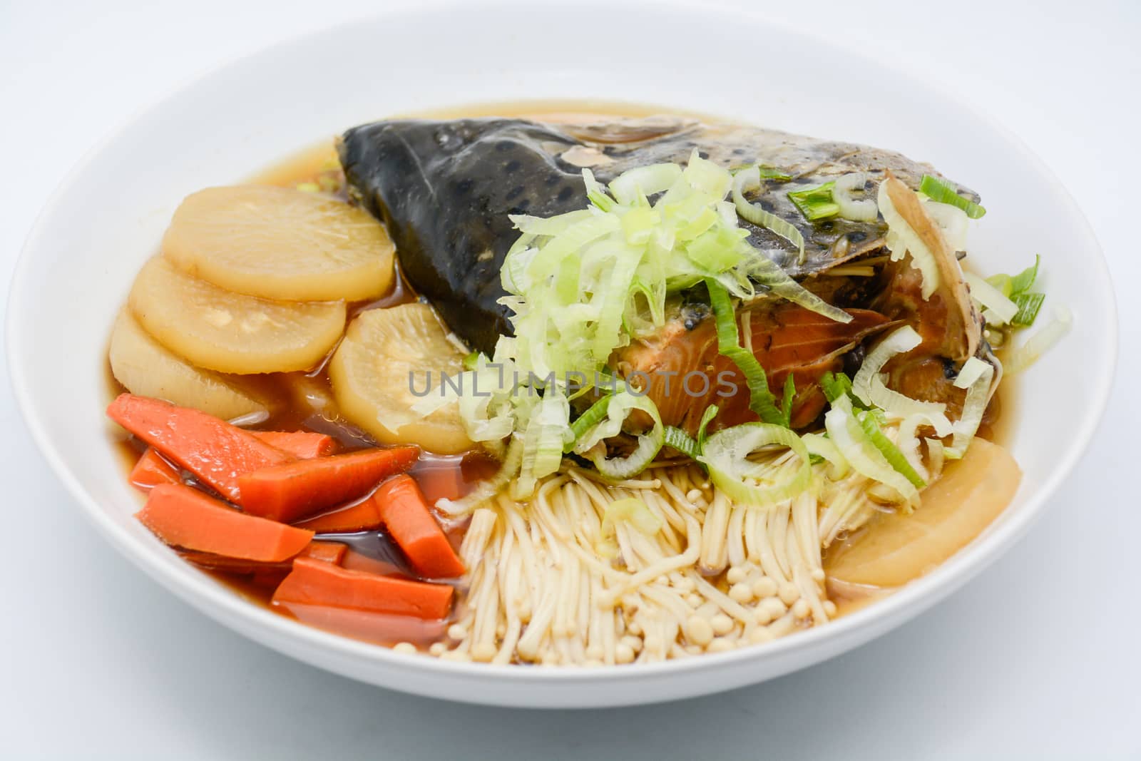 Soup Salmon in soy source with vegetables, Japanese foods