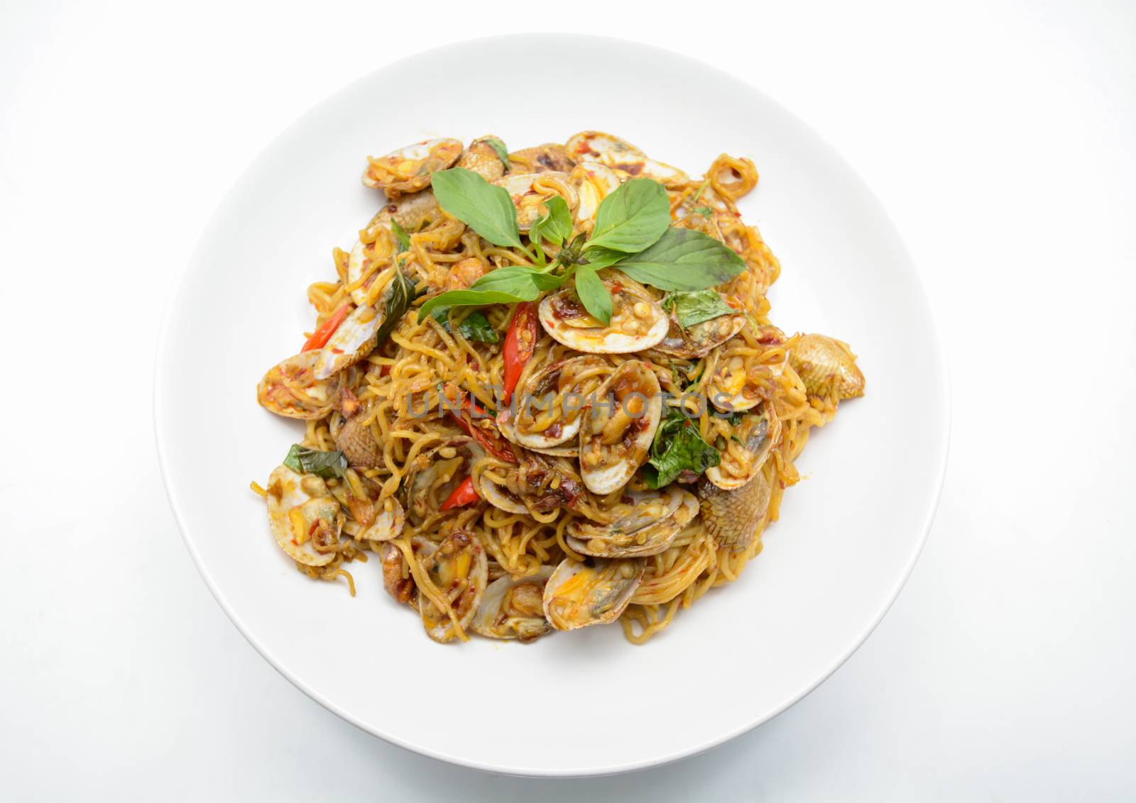 Stir fried noodles with clams and herbs, hot and spicy dish by yuiyuize