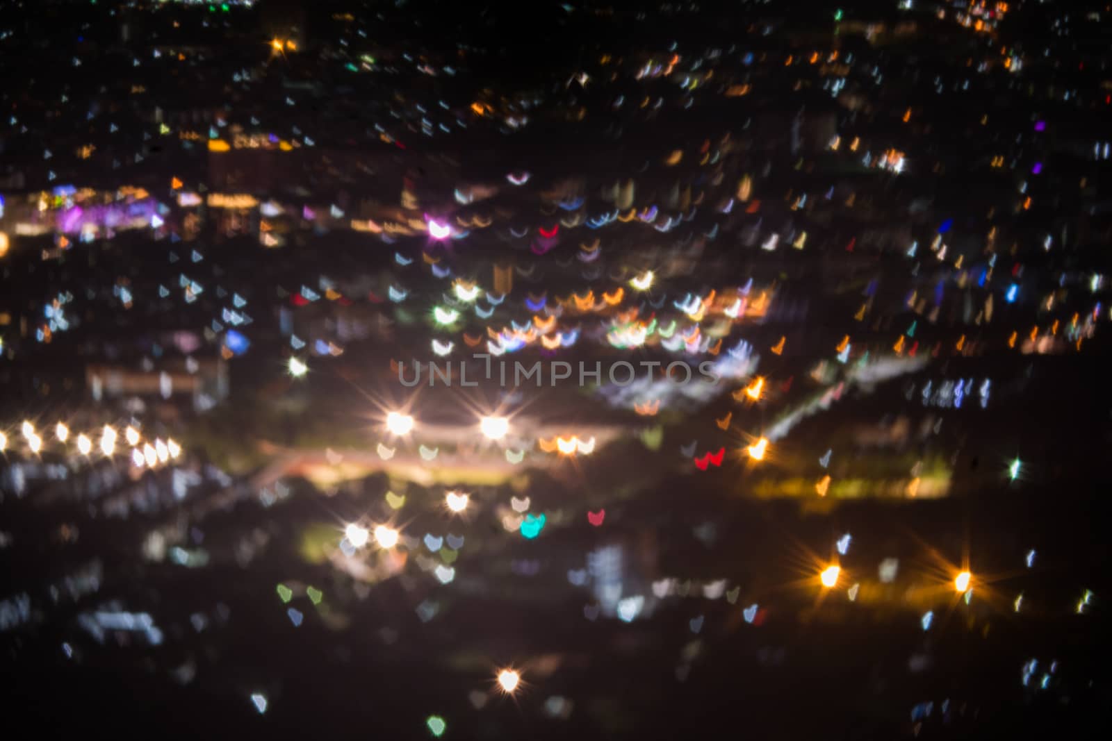 Abstract, Beautiful Bokeh landscape of city at night, Bokeh ligh by yuiyuize