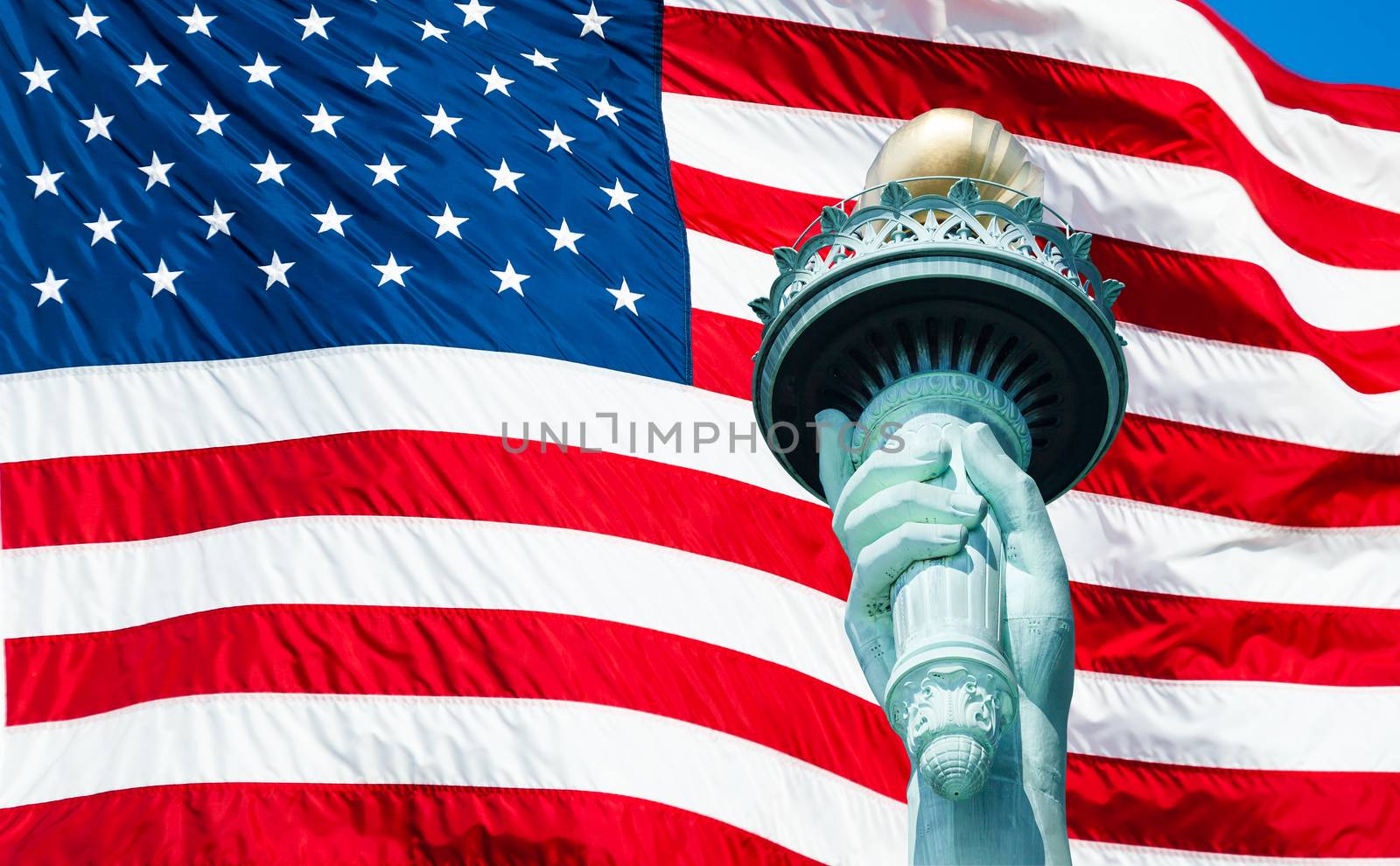 Statue of Liberty torch and US Flag by hanusst