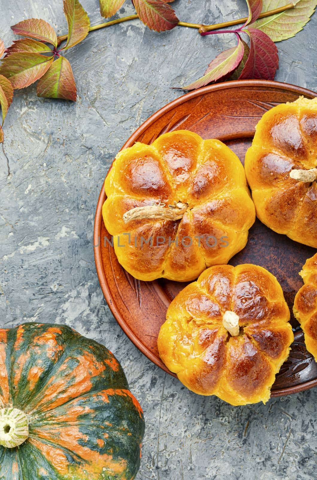 Fragrant homemade buns made from pumpkin dough.