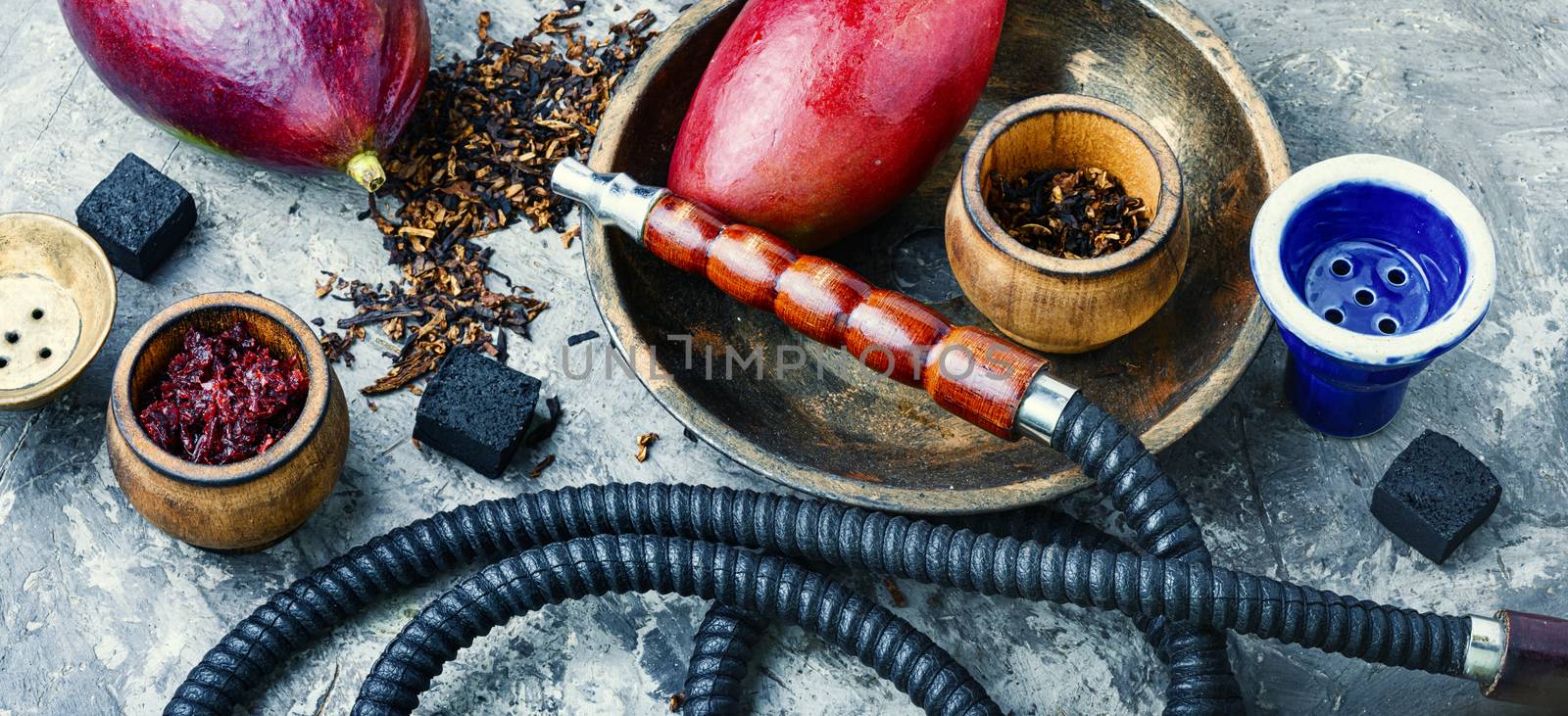 Details of the egyptian hookah.Shisha with mango flavor.Smoking apple tobacco