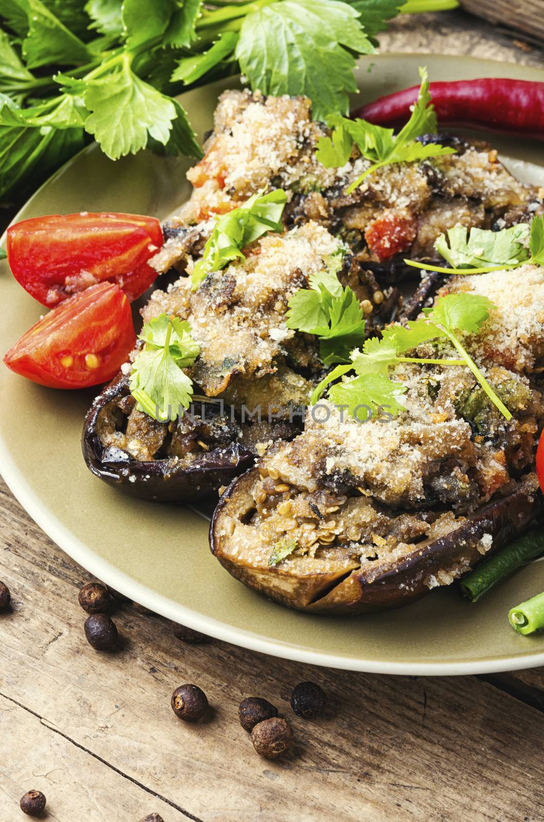 Baked eggplant with vegetables.Roasted vegetables on plate