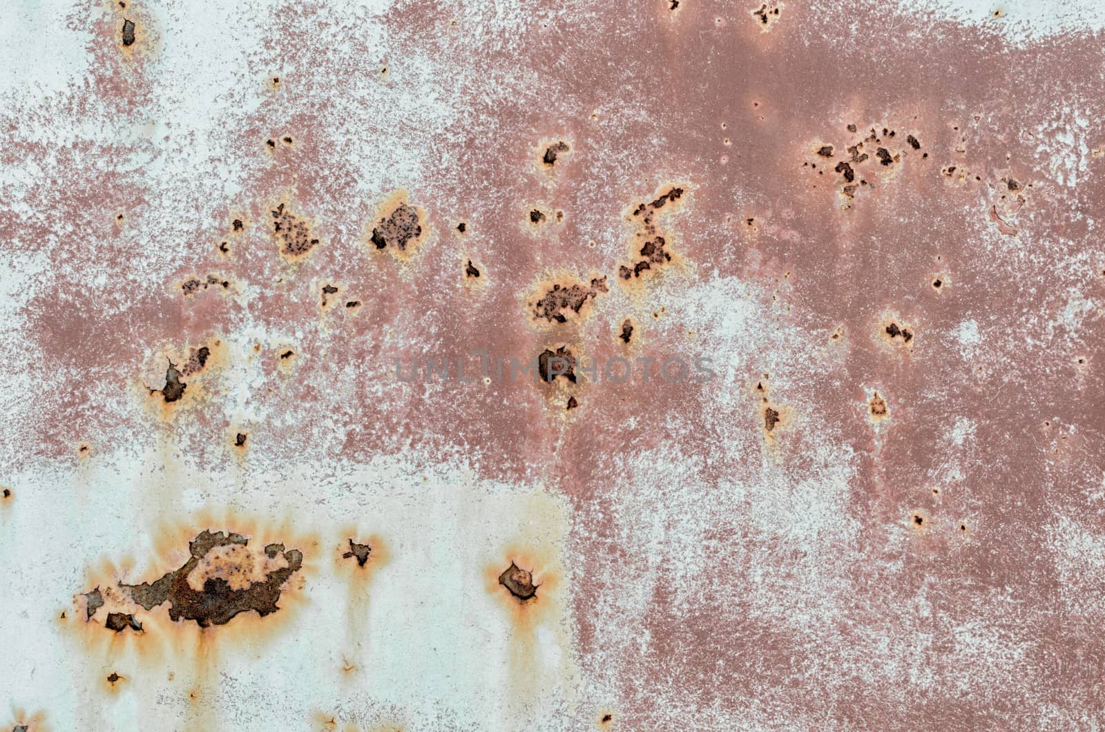 background texture pattern of old rusty iron wall with orange paint close up