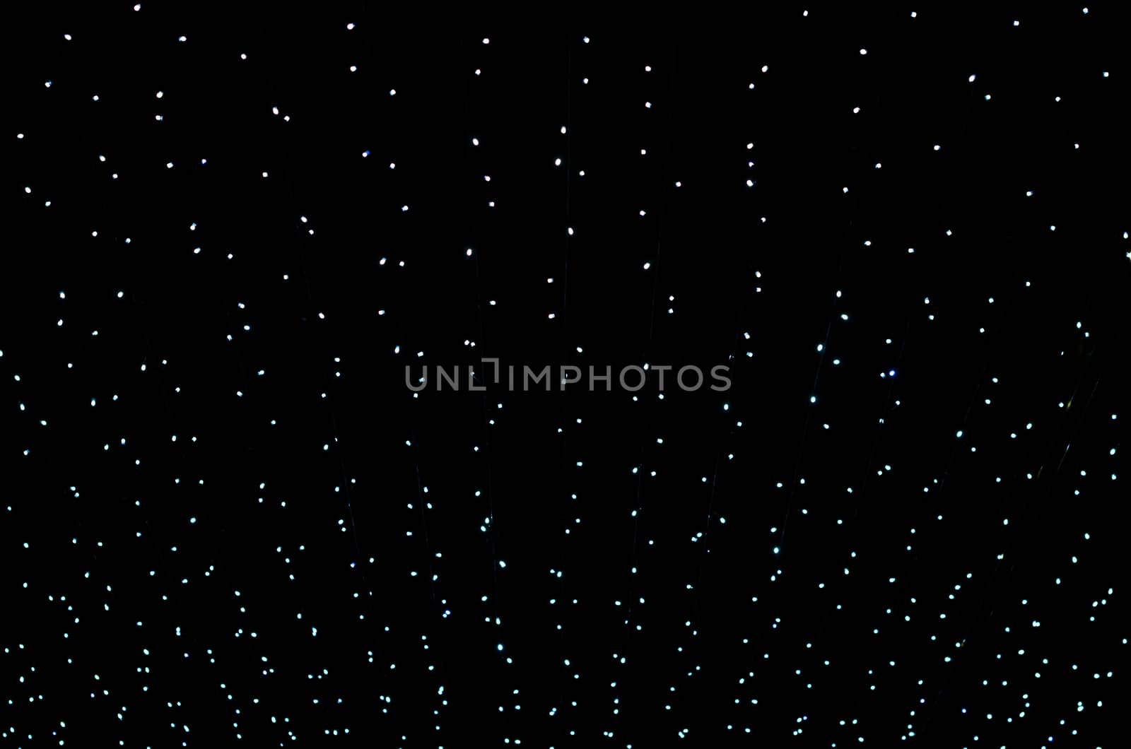 small lamps in the dark abstract black background