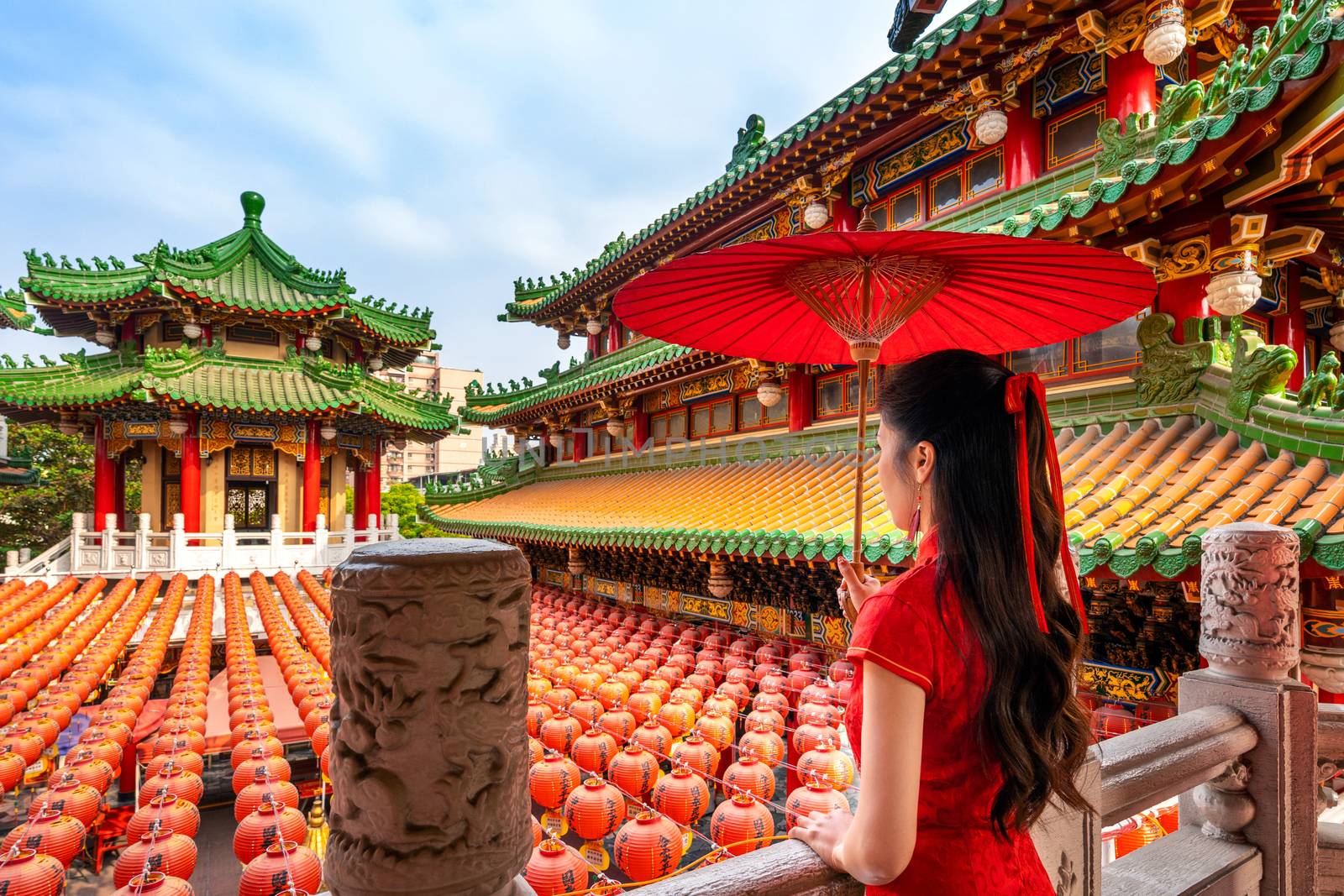Asian woman wearing traditional Chinese dress at Sanfeng Temple in Kaohsiung, Taiwan. by gutarphotoghaphy