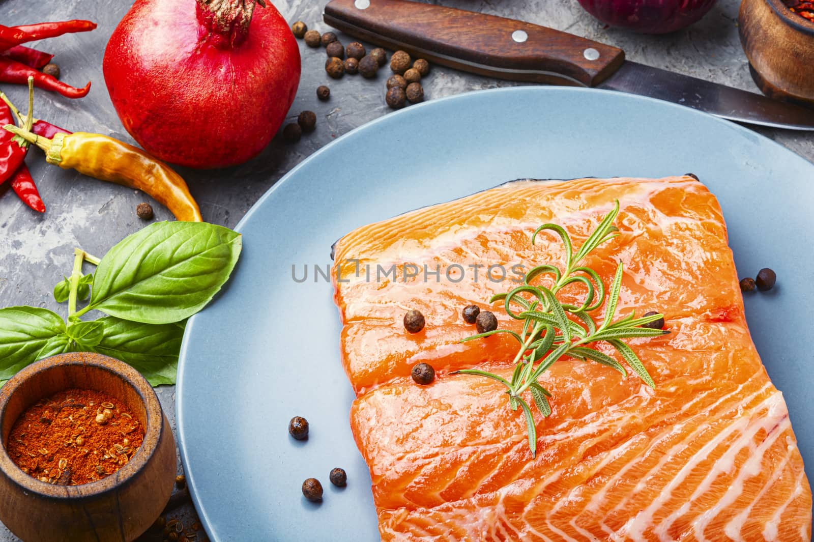 Salt fish.Raw salmon fillet with cooking ingredients