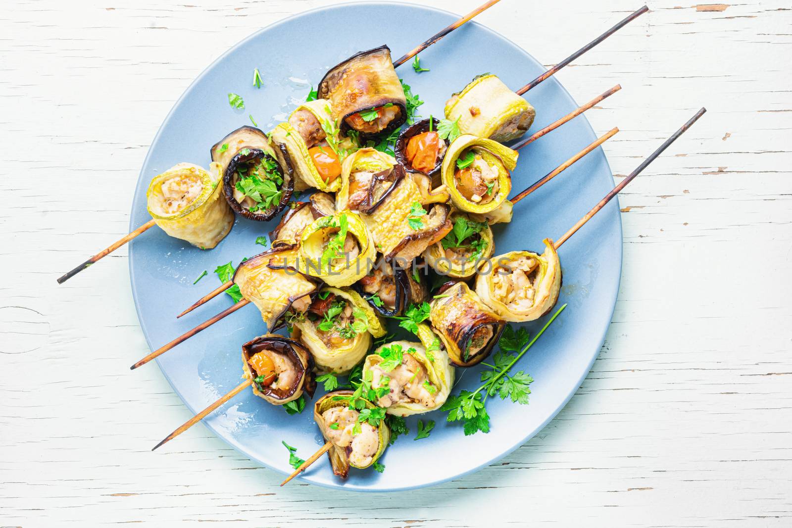 Eggplant and zucchini stuffed with meat on skewers.Vegetarian skewers