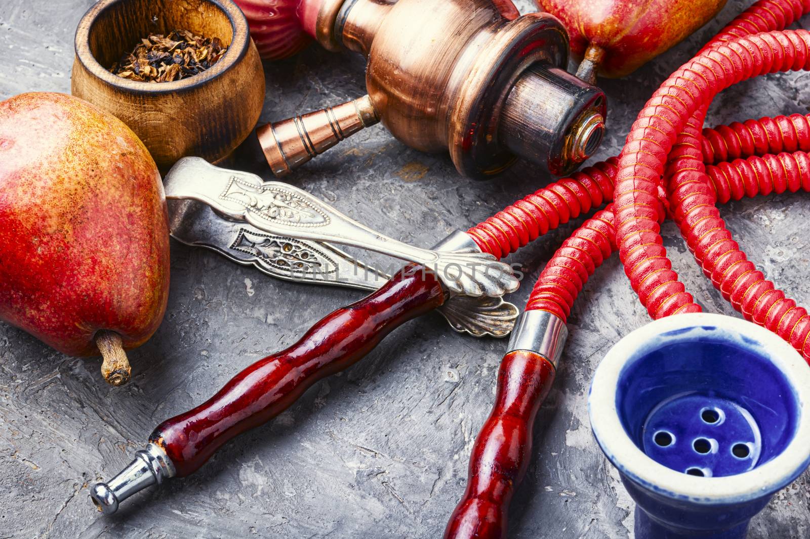 Smoking hookah.Details of Turkish kalian.Shisha with a fruity aroma of tobacco.