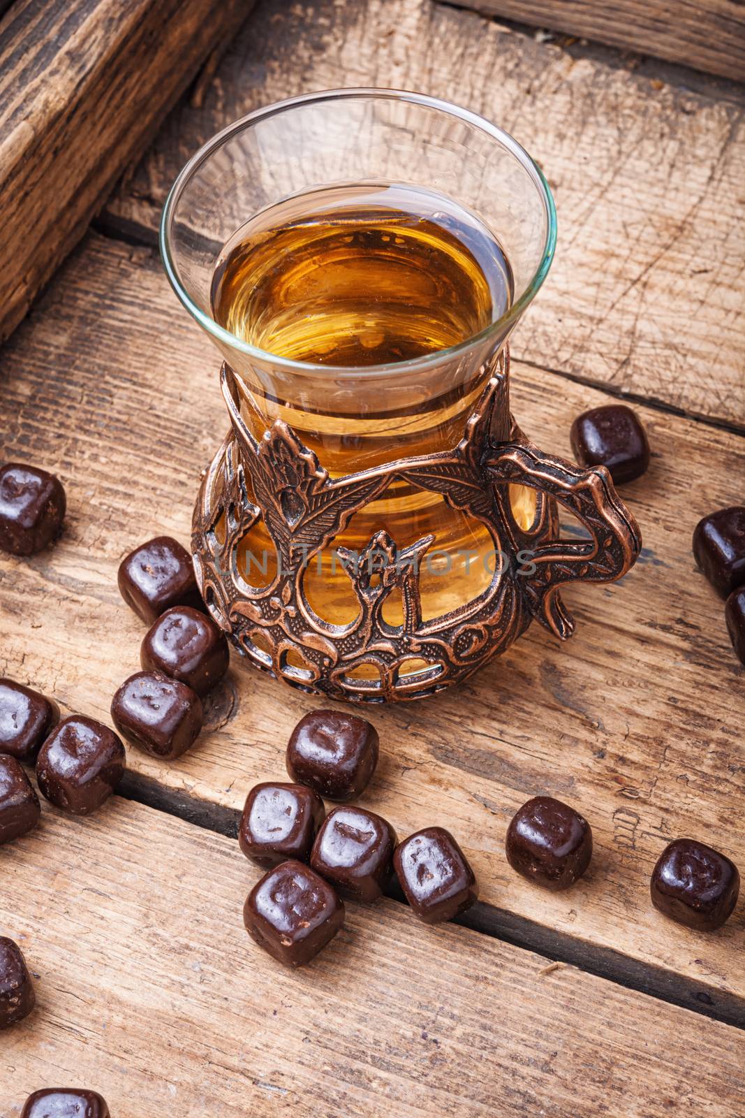 Turkish tea on wooden table by LMykola